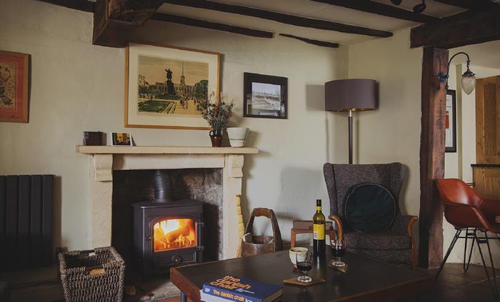 Enjoy long cosy evenings by the fire in the stylish open plan ground floor at Tredegar House.